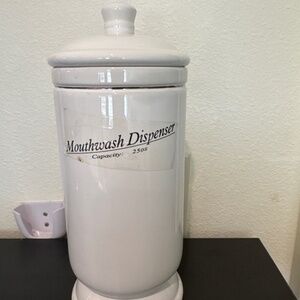 Mouth wash dispenser